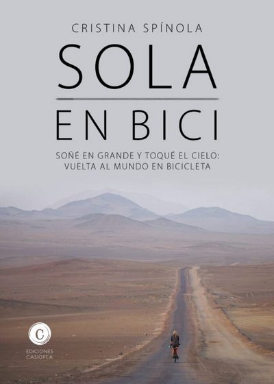 Sola en bici